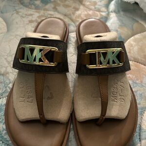 Michael Kors Brown Sandals with Gold Logo. Extremely comfortable. Quite stylish!